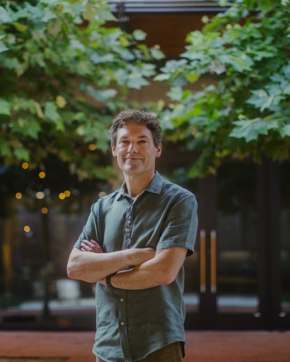Daniel John Stine, AIA, in the courtyard at Lake Flato Architects, San Antonio